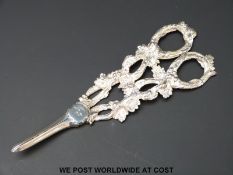 A pair of Victorian hallmarked silver grape scissors, the handles formed as vines,