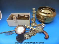 A quantity of brassware to include jardiniere and candlesticks