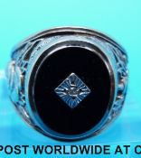 A yellow metal gents ring marked 9ct gold,