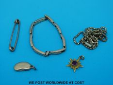 A yellow metal chain, yellow metal watch strap marked 9ct,