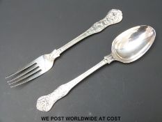 A Victorian hallmarked silver chistening fork and spoon,