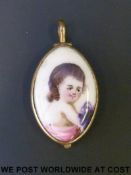 An 18thC enamel portrait locket decorated with an infant girl, the hinged back a magnifying glass.