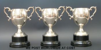 Three Goldsmiths & Silversmiths Company Ltd hallmarked silver trophy cups, 1935, 1937 and 1938,