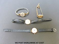 Four ladies wristwatches including a Fuji Diagold 14ct gold wristwatch with a single diamond to the