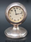 A George V hallmarked silver clock, Birmingham 1925 makers mark rubbed, also stamped Pat No. 204.