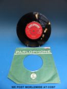 The Beatles “Love Me Do” (Parlophone 45-R 4949, first pressing, Red Label, matrix 7XCE 17144 1N).