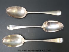 Three various Georgian bottom hallmarked silver table spoons, length of longest 21.