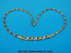 A 9ct gold graduated bicolour necklace (9.