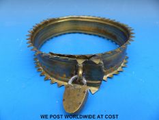 A Victorian brass dog collar with period padlock,