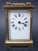 A brass cased French carriage clock, Wiltshire Constabulary inscription,