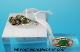 Two 9ct gold rings one set with an emerald and opals the other four emeralds