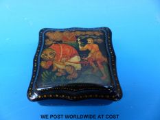 A small lacquer box with decoration of a bear pulling a plough, signed by the artist (3.
