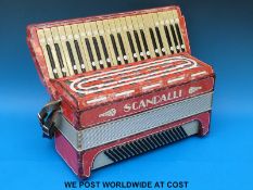 A cased c1930 120 bass Scandalli piano accordion,