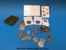 A small collection of coins including silver proof