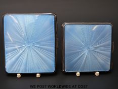 A matching hallmarked silver compact and cigarette case with guilloche enamel decoration B'ham 1936