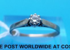 A 9ct gold ring set with a diamond (size N)