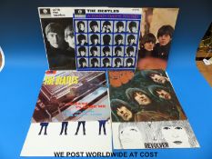 Ten original singles by The Beatles in original sleeves and two EPs: “Long Tall Sally” and “The