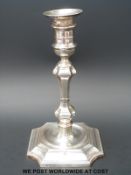 A Victorian hallmarked silver candlestick of square knopped form with incuse corners Sheffield 1890,
