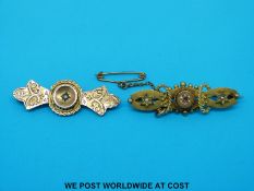 A hallmarked 9ct gold brooch set with seed pearls and a ruby another 9ct gold brooch set with a