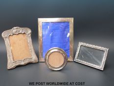 Two hallmarked silver photograph frames (to suit 6x4in photos) one Art Nouveau,