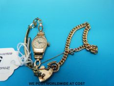 A 9ct gold curb link bracelet and a 9ct gold ladies wristwatch