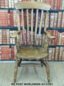 A 19thC elm seated Windsor armchair