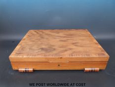 An Art Deco Walnut cased six place canteen of plated cutlery