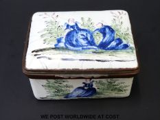 A mid 18thC Bilston enamel patch box decorated with a man kneeling before a woman,