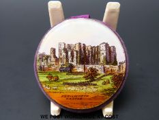 A Victorian pin cushion decorated glass plaque of Kenilworth Castle and a mirror verso, 4.