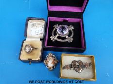 A hallmarked Scottish silver and amethyst brooch,