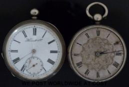 A hallmarked silver pocket watch and white metal example