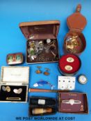 A quantity of cufflinks to include tigers eye and a cheeroot holder with hallmarked silver mounts