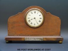 A circa 1920's French mantel timepiece, with banded inlay decoration to case,