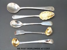 A Georgian hallmarked silver berry spoon with gilt wash bowl together with four various first half