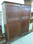 A 19thC mahogany compactum with fitted interior