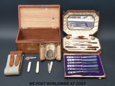 A cased set of six hallmarked silver-handled knives, a silver-bladed fruit knife,