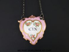 An 18thC Bilston enamel wine label for Gin with painter's mark verso