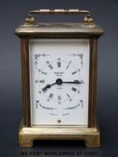 A Bayard carriage clock with keyless movement,