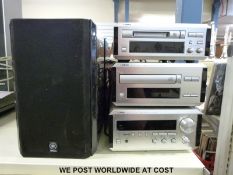 A Yamaha radio/CD etc with speakers