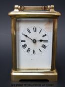 A French brass carriage clock,