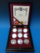 A Queen Elizabeth II 40th Anniversary Coronation Collection comprising 18 crown sized silver proof