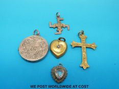 A hallmarked 9ct gold cross pendant with chased decoration,