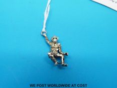 A gem set monkey pendant
