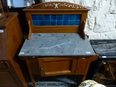 A satin walnut marble topped and tiled back washstand (W83 x D43 x H111cm)