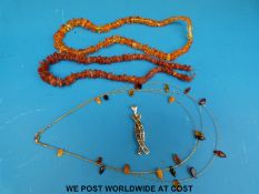 Two amber necklaces made up of irregular shaped pieces of amber,