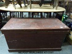 A large 19thC pine blanket box with brass handles (H52 x W106 x D53cm)