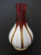 Bohemian overlaid cranberry glass bottle vase with gilt decoration (19.