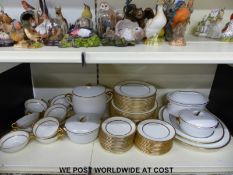 A Royal Doulton and Royal Worcester predominately twelve place setting dinner service including