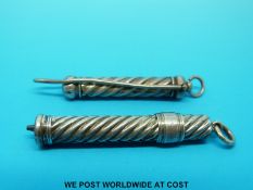 A hallmarked silver wrythen moulded propelling pencil with suspension loop by Sampson Mordan & Co