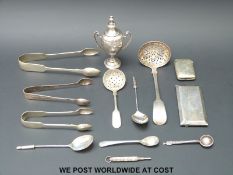 A hallmarked silver trophy cup, silver card case,